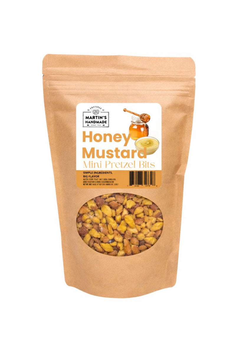 Bag of honey mustard mini pretzel bits with a label on a white background
