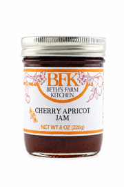 Jar of cherry apricot jam from Beth's Farm Kitchen on a white background