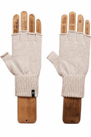 A pair of off-white knit fingerless gloves displayed on wooden hand forms against a plain white background.