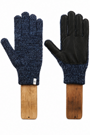 A pair of knit gloves with dark brown leather palms, displayed on wooden handles against a white background. One glove shows the blue and navy heathered knit back, and the other shows the smooth black leather palm side.