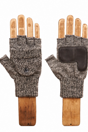 A pair of fingerless knit gloves displayed on wooden hand forms against a plain white background. One glove is shown from the back, featuring a dark gray and beige heathered knit body with a black rubberized palm patch, and the other is shown from the front with a small snap-button closure.