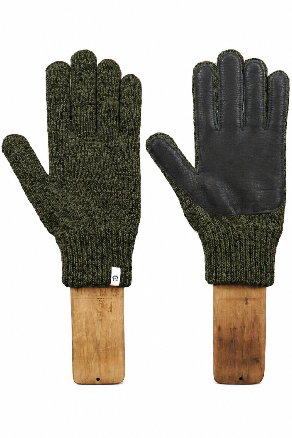 A pair of knit gloves displayed side by side on wooden hangers against a plain white background. One glove shows the textured olive green knit body, and the other shows the black leather palm side.