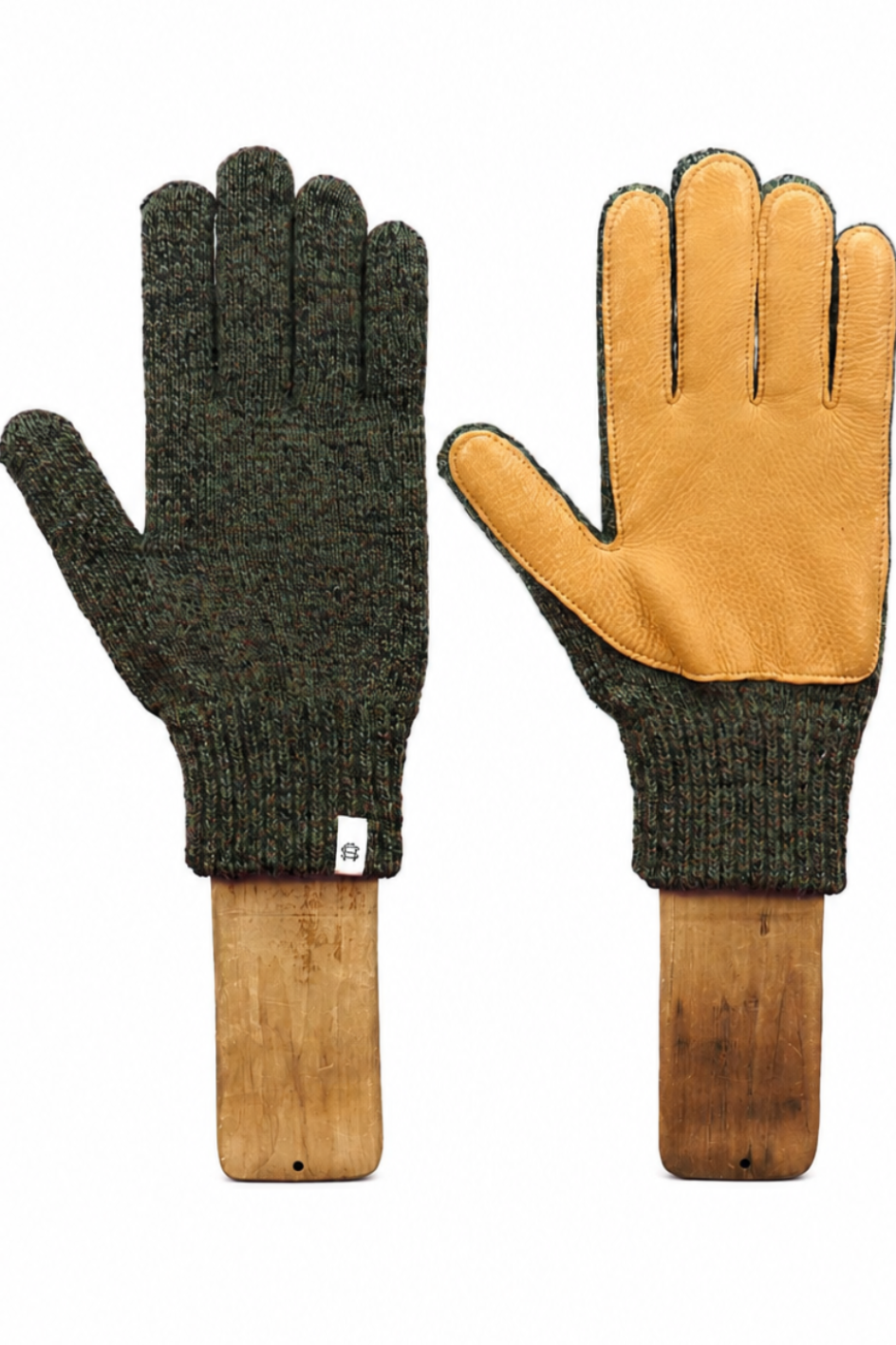 A pair of knit gloves displayed side by side on wooden hangers against a plain white background. One glove shows the dark olive green knit body, and the other shows the tan leather palm side with dark green trim.
