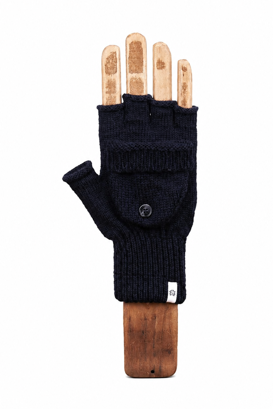 A single dark navy fingerless knit glove displayed on a wooden hand form against a plain white background.