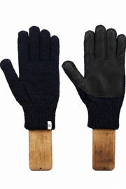 A pair of black knit and leather gloves displayed side-by-side on wooden hangers against a plain white background.