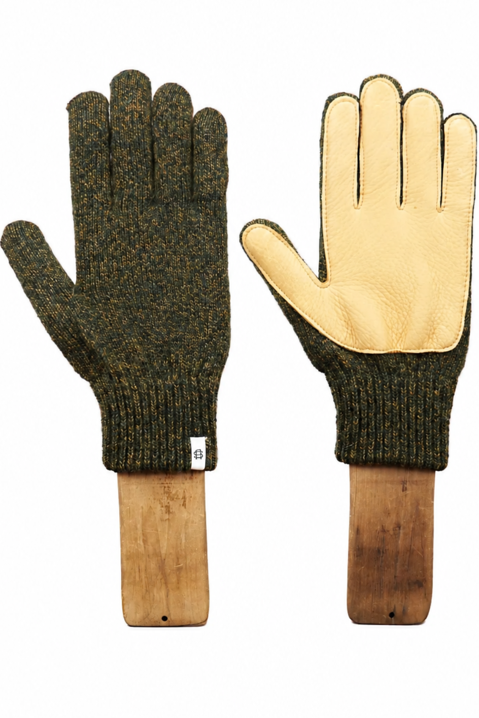 A pair of work gloves displayed side-by-side on wooden handles against a plain white background. One glove shows the dark olive green knit back, and the other shows the light tan leather palm side.
