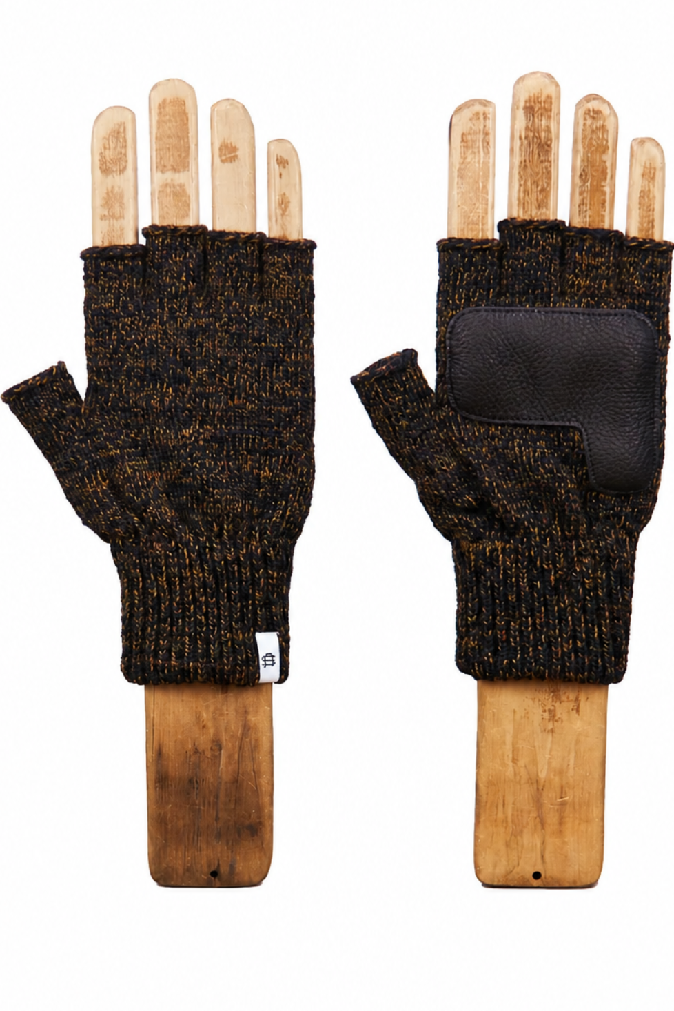 A pair of fingerless knit gloves in a dark brown and black heathered pattern, displayed on wooden mannequin hands against a solid white background.