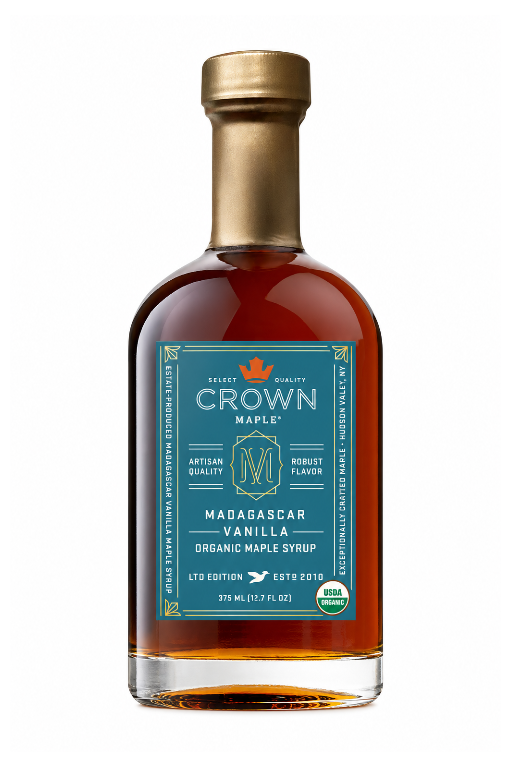 A bottle of Crown Maple Madagascar Vanilla organic maple syrup on a clean white background. The bottle is filled with amber liquid and features a teal label with gold and white text, topped with a metallic gold cap.