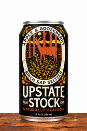 A 12 fl oz can of Upstate Stock Naturally Flavored Apple & Gooseberry Birch Sap Seltzer, standing on a rustic wooden surface against a solid white background.